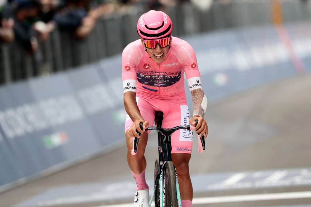 Bahrain - Victorious Portuguese rider Afonso Eulalio, wearing the overall leader's pink jersey (Maglia Rosa), crosses the finish line at the end of the 9th stage of the Giro d'Italia 2026 - Tour of Italy cycling race between Cervia and Corno alle Scale, near Doganaccia, central Italy on May 17, 2026.