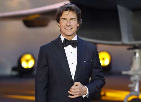 Tom Cruise quiso convertir a David Beckham a la cienciología con campo de fútbol