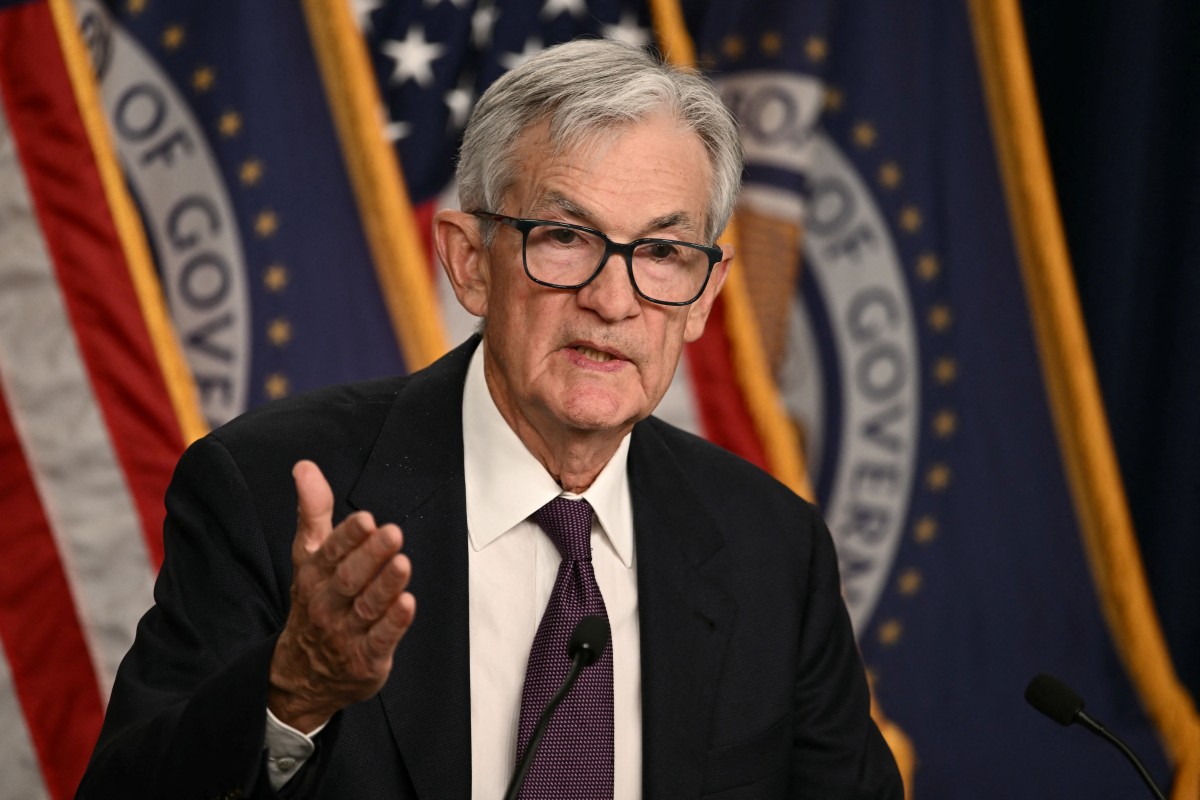 (FILES) US Federal Reserve Chair Jerome Powell speaks during a press conference following the Federal Open Market Committee meeting at the Federal Reserve Board Building in Washington, DC, on March 18, 2026.