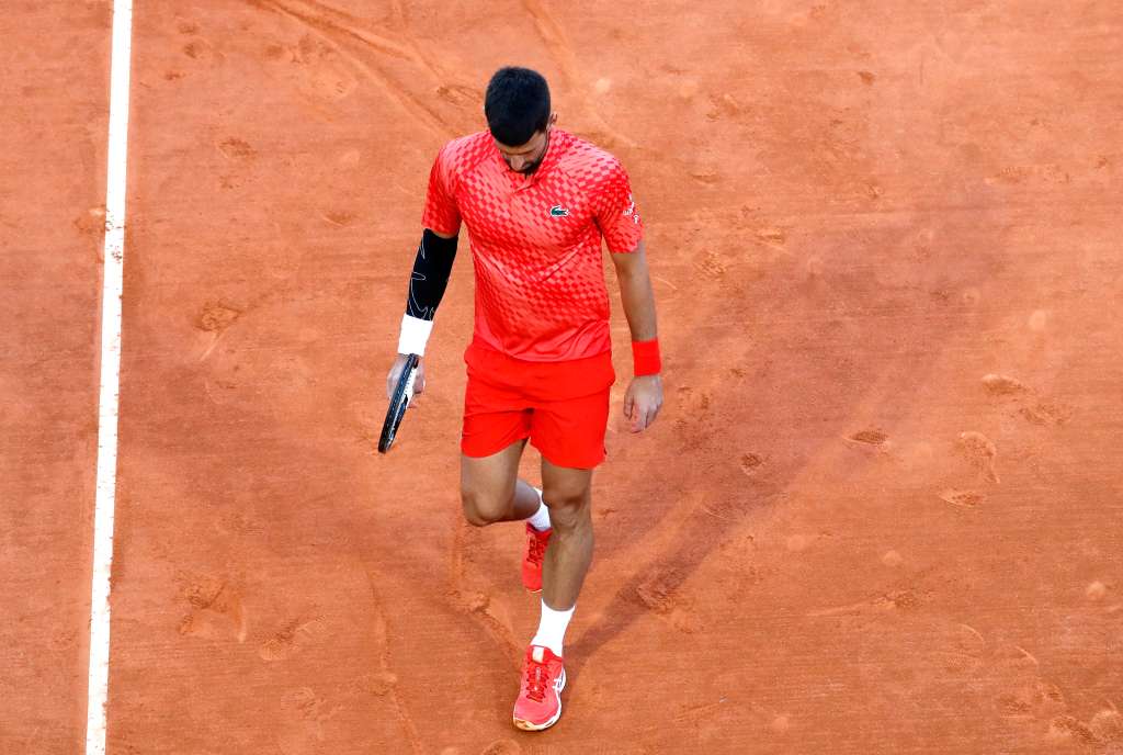 Roquebrune Cap Martin (France), 13/04/2023.- Novak Djokovic of Serbia reacts after losing his third round match against Lorenzo Musetti of Italy at the Monte-Carlo Rolex Masters tournament in Roquebrune Cap Martin, France, 13 April 2023. (Tenis, Francia, Italia) EFE/EPA/SEBASTIEN NOGIER