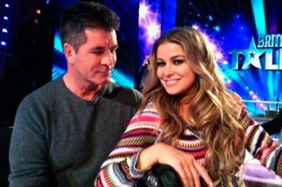 Simon Cowell y Carmen Electra.