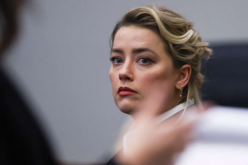 Fairfax (United States), 13/04/2022.- Actress Amber Heard attends the 50 million US dollars Depp vs Heard defamation trial at the Fairfax County Circuit Court in Fairfax, Virginia, USA, 13 April 2022. Johnny Depp's 50 million US dollars defamation lawsuit against Amber Heard that started on 10 April is expected to last five or six weeks. (Estados Unidos) EFE/EPA/EVELYN HOCKSTEIN / POOL
