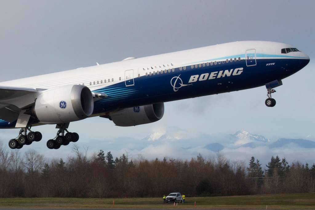 (FILES) A Boeing 777X airplane takes off on its inaugural flight at Paine Field in Everett, Washington on January 25, 2020.