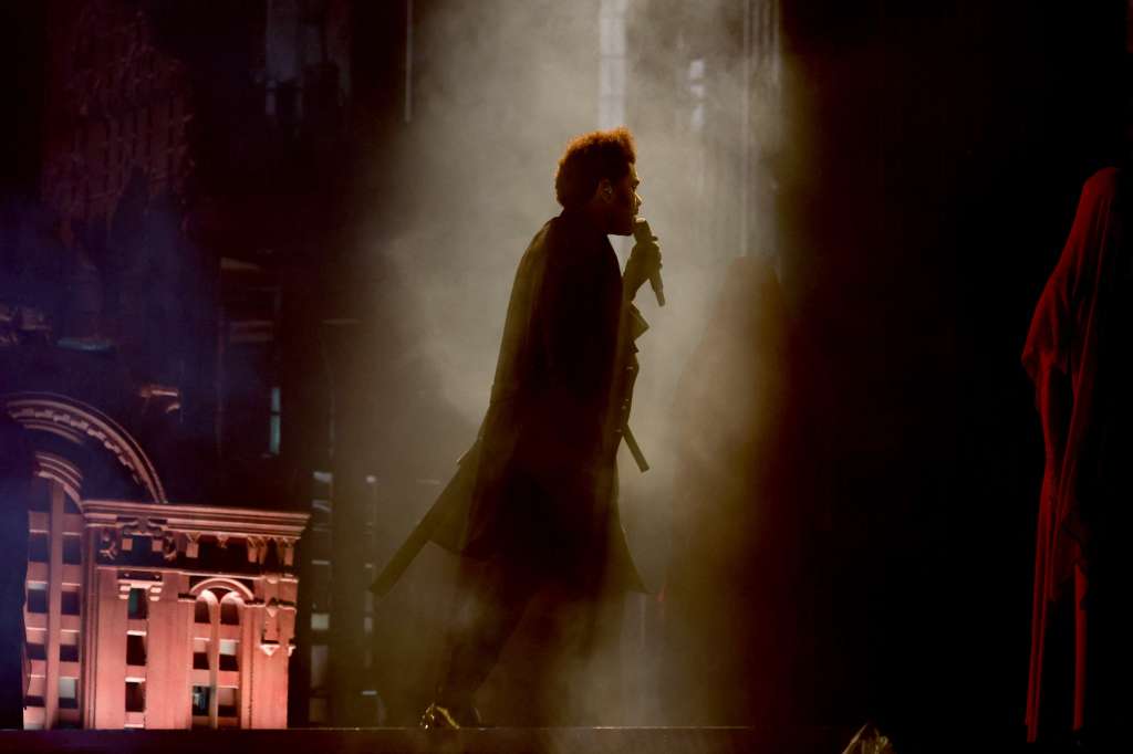 EAST RUTHERFORD, NEW JERSEY - JULY 16: The Weeknd performs at the "After Hours Til Dawn" Tour at Met Life Stadium on July 16, 2022 in East Rutherford, New Jersey. Theo Wargo/Getty Images for Live Nation/AFP (Photo by Theo Wargo / GETTY IMAGES NORTH AMERICA / Getty Images via AFP)