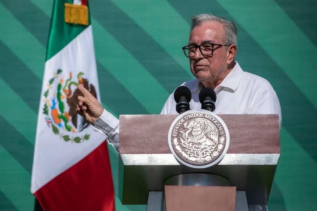 (FILES) Sinaloa Governor Ruben Rocha Moya (R) speaks next to Mexican President Andres Manuel Lopez Obrador during AMLO's daily morning press conference, in Mazatlan, Sinaloa State, Mexico, on April 8, 2024.