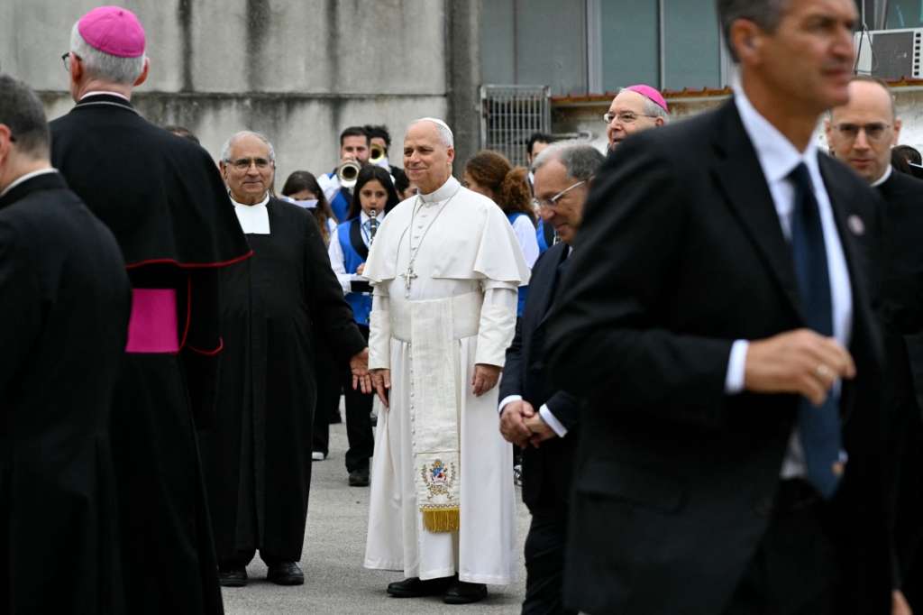 Pope Leo XIV arrives to meet with members of the “Temple of Charity” helping people from disadvantaged situations in the Luisa Trapani Hall as part of a pastoral visit in Pompei on May 8, 2026. (Photo by Andreas SOLARO / AFP)