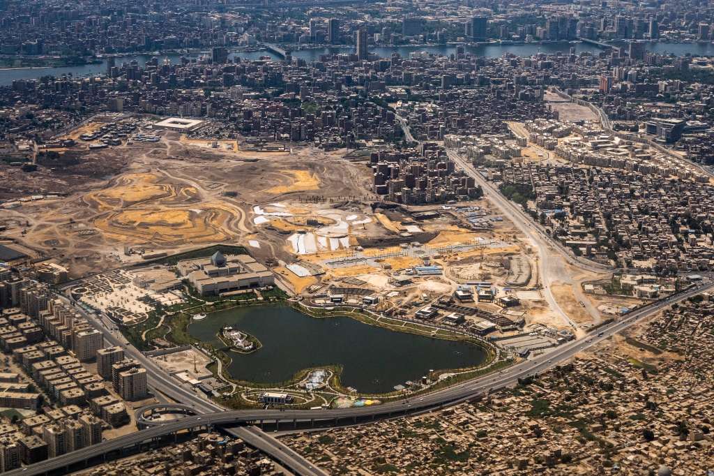 (FILES) This aerial view taken on April 28, 2023 shows new developments in the Ain al-Sira district around the National Museum of Egyptian Civilisation (NMEC) and on the edge of the historic Basatin cemetery in east-central Cairo.
