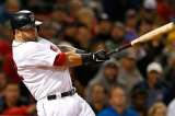Con grand slam de Mike Napoli, los Medias Rojas vencieron a los Atléticos