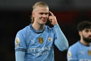 Manchester City's Norwegian striker #09 Erling Haaland gestures on the pitch after the English Premier League football match between Arsenal and Manchester City at the Emirates Stadium in London on February 2, 2025.