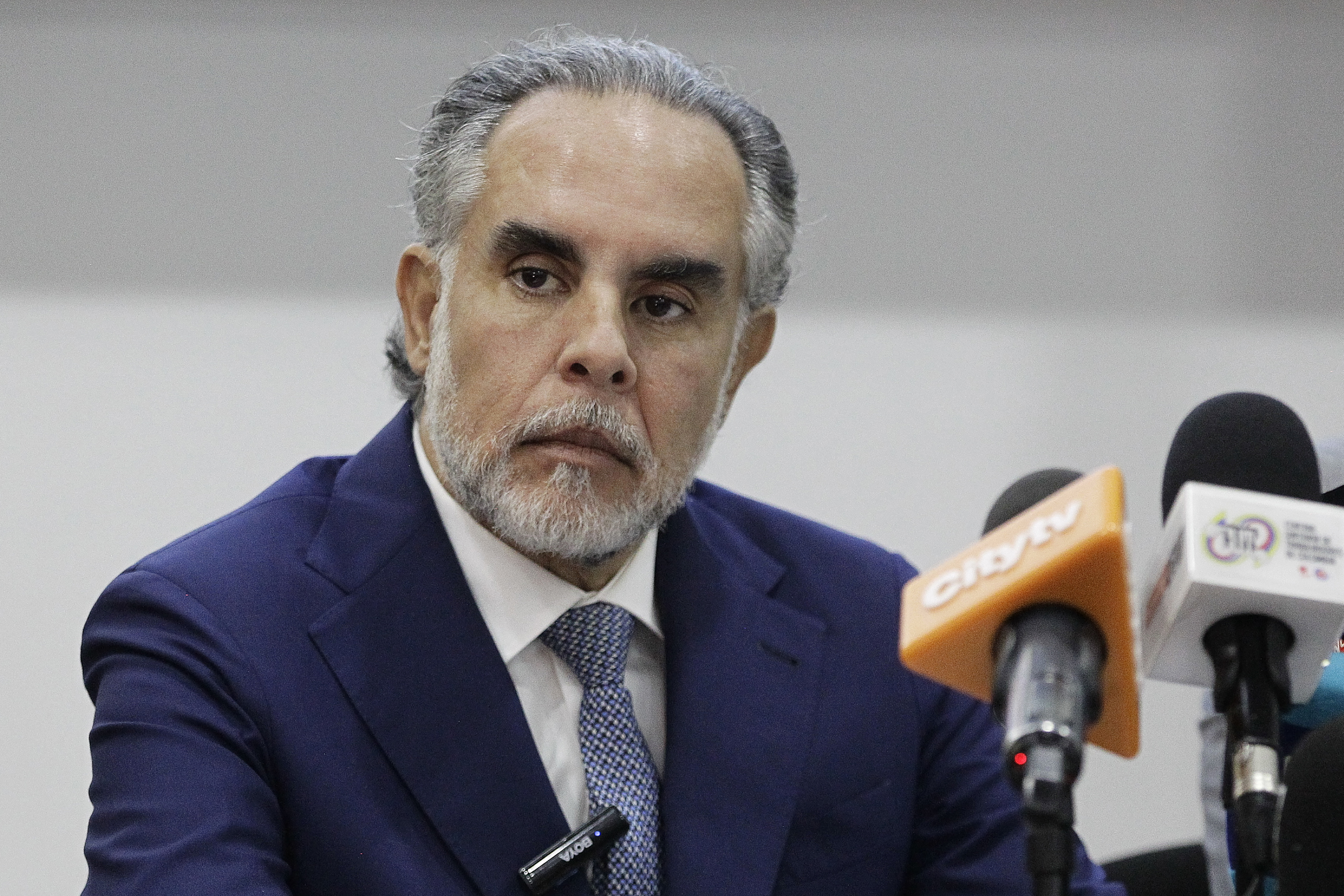 (FILES) The Minister of the Interior, Armando Benedetti, looks on during the presentation of the questions for the referendum sponsored by Colombian President Gustavo Petro in Bogota on April 22, 2025.