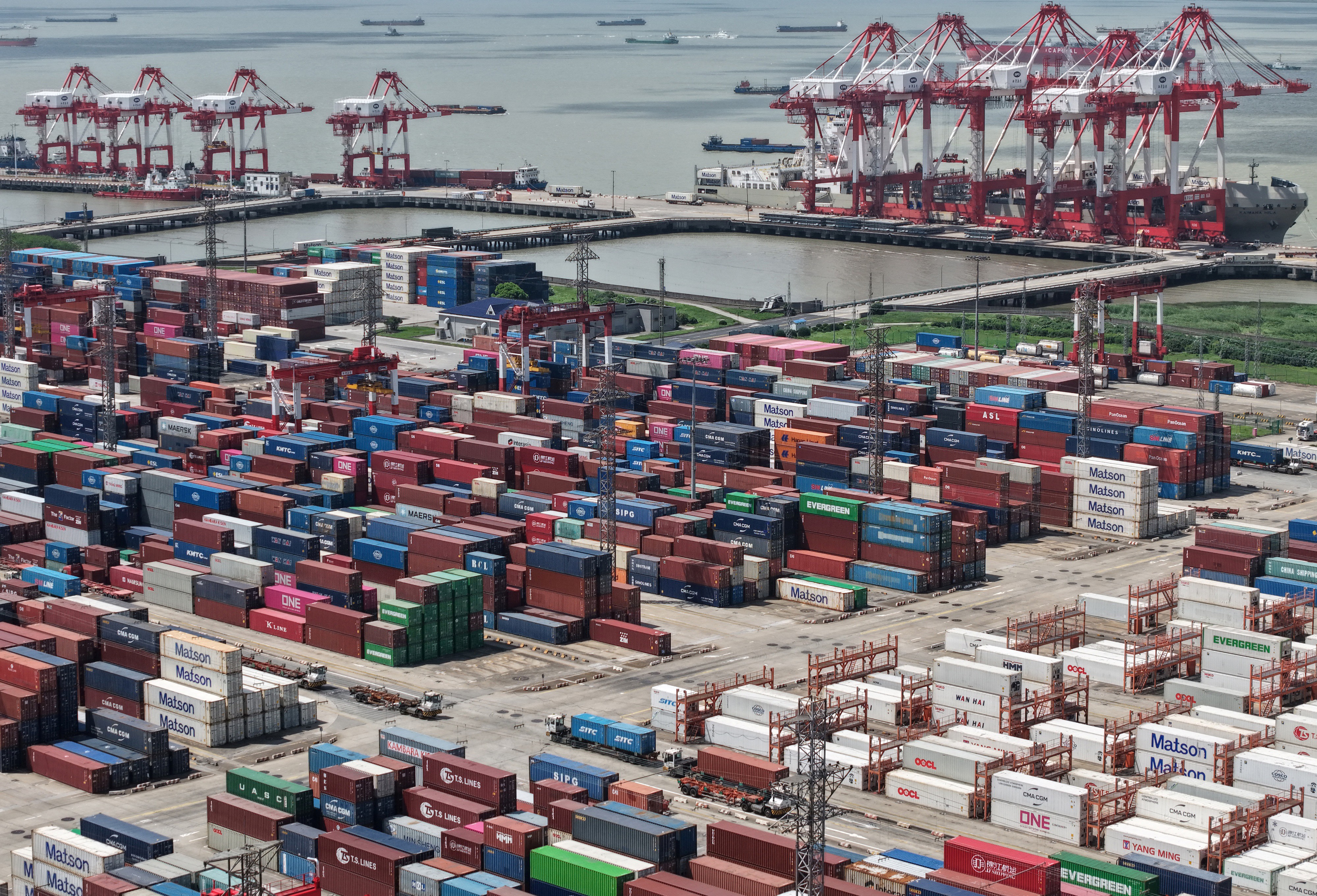 This aerial photo shows containers at the Shanghai international port in Shanghai on November 7, 2025.  (Photo by AFP) / CHINA OUT