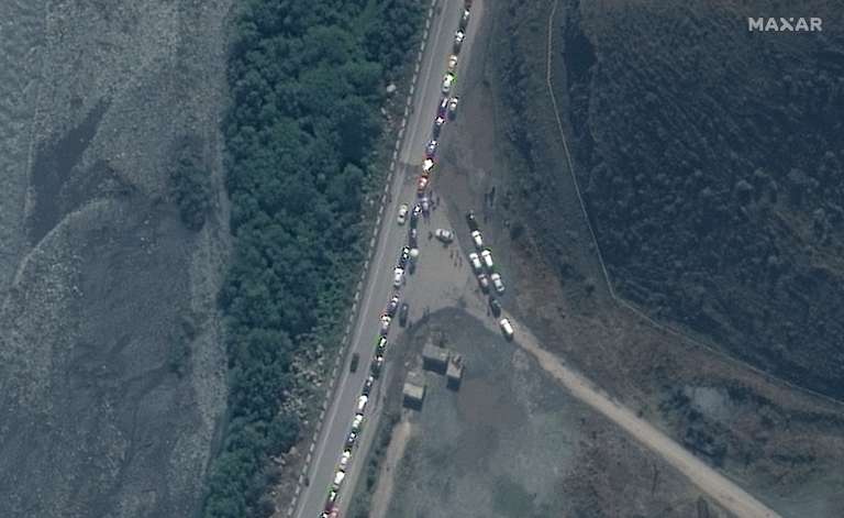 - (Georgia), 25/09/2022.- A handout satellite image made available by Maxar Technologies shows traffic jam near Russia's border with Georgia, 25 September 2022 (issued 27 September 2022). Russian President Putin announced in a televised address to the nation on 21 September, that he signed a decree on partial mobilization in the Russian Federation due to the conflict in Ukraine. Georgian Interior Minister Vakhtang Gomelauri said on 27 September, that in recent days some 10,000 Russians have crossed the border with Georgia every day. Thousands of Russian men left Russia since the mobilization was announced. (Rusia, Ucrania, Estados Unidos) EFE/EPA/MAXAR TECHNOLOGIES HANDOUT -- MANDATORY CREDIT: SATELLITE IMAGE 2022 MAXAR TECHNOLOGIES -- THE WATERMARK MAY NOT BE REMOVED/CROPPED -- HANDOUT EDITORIAL USE ONLY/NO SALES