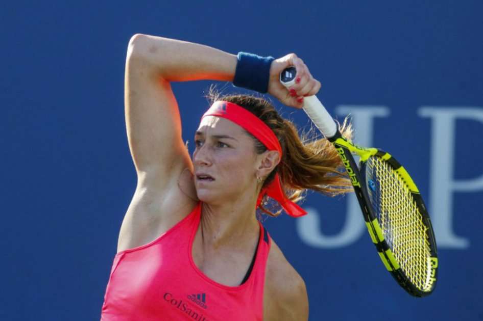 La tenista colombiana Mariana Duque durante el partido frente a la serbia Jelena Jankovic. / AFP