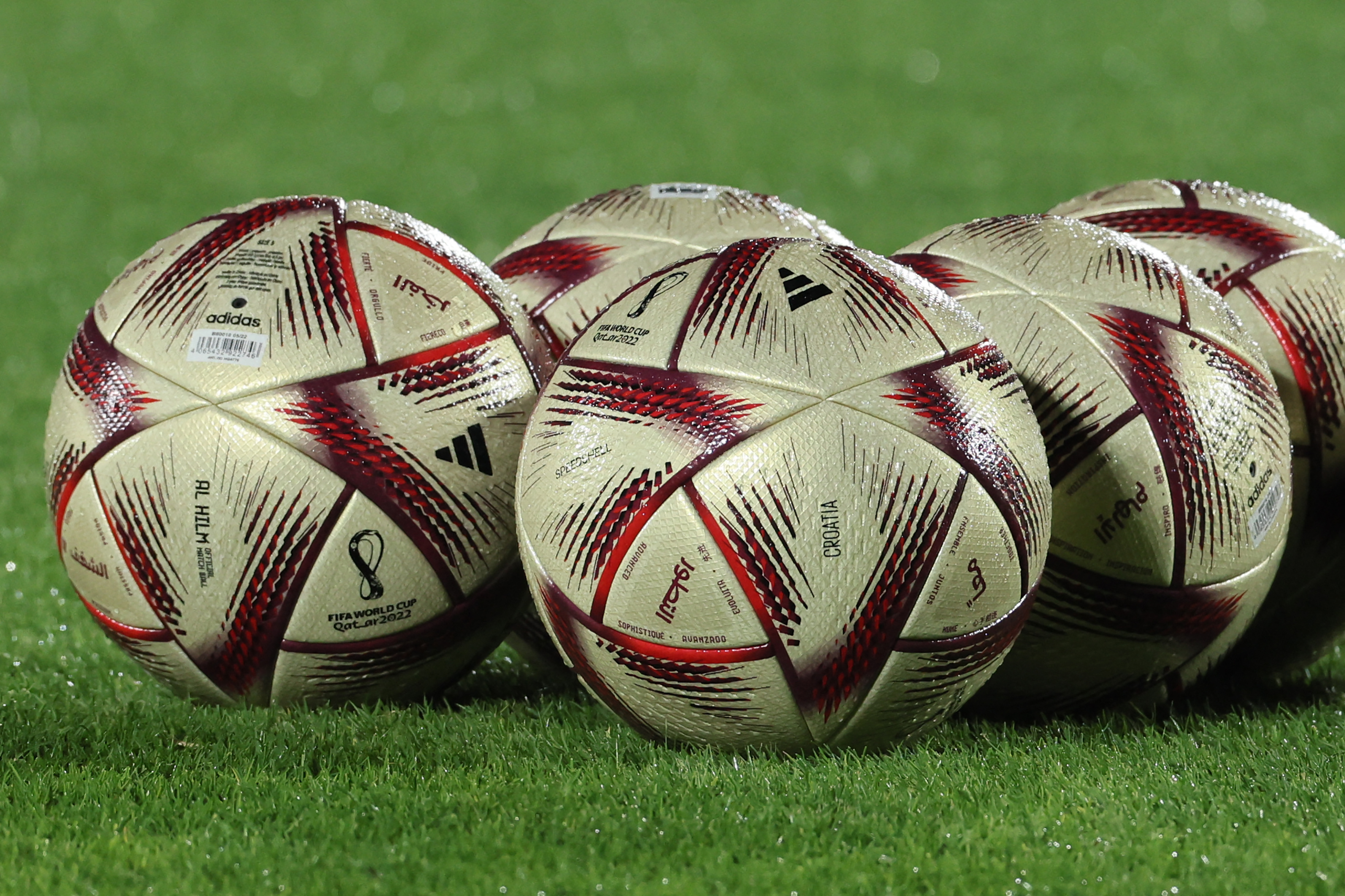 "Al Hilm" balls, official match balls which will be used in the Qatar 2022 World Cup football semi-finals and final, are seen during a training session with the Croatia team in Doha on December 11, 2022, ahead of the Qatar 2022 World Cup football semi-final match between Croatia and Argentina. (Photo by JACK GUEZ / AFP)