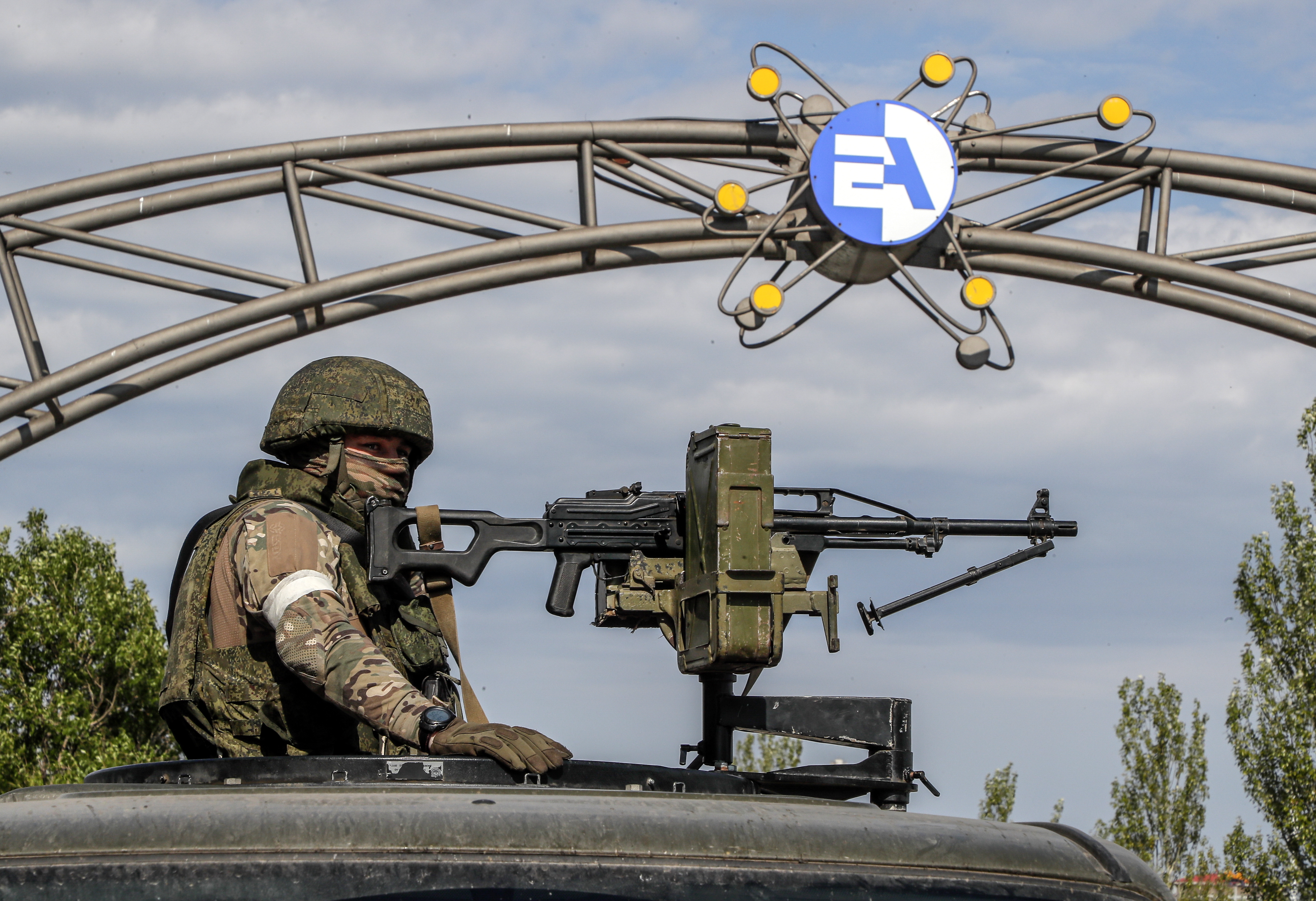 Enerhodar (Ukraine).- (FILE) - A picture taken during a visit to Mariupol organized by the Russian military shows Russian servicemen on guard in front of the main entrance of the Zaporizhzhia Nuclear Power Station in Enerhodar, southeastern Ukraine, 01 May 2022 (reissued 03 June 2022). 04 June 2022 marks 100 days since on 24 February 2022 Russian troops invaded Ukrainian territory in what the Russian president declared a "Special Military Operation", starting an armed conflict that has provoked destruction and a humanitarian crisis. According to the UNHCR, more than 6.8 million refugees have fled Ukraine, and a further 7.7 million people have been displaced internally within Ukraine since. The Russian invasion was met by Western countries with heavy economic sanctions against Russian companies and individuals, as well as weaponry deliveries and financial support to Ukraine. (Rusia, Ucrania) EFE/EPA/SERGEI ILNITSKY ATTENTION: This Image is part of a PHOTO SET *** Local Caption *** 57651376