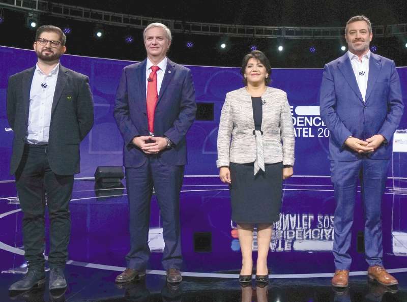 Ninguno de los candidatos presidenciales en Chile supera el 30 % de intención de voto en los sondeos. / AFP
