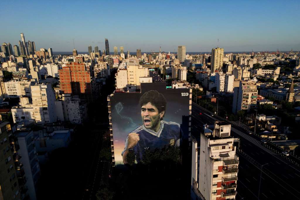 TOPSHOT - This aerial view shows a mural of the late Argentine football legend Diego Maradona painted by artist Martin Ron in Buenos Aires on March 10, 2025.