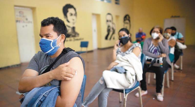 Actualmente se intenta localizar a la mayor cantidad de migrantes venezolanos para determinar qué tanto han sido afectados por el COVID-19. / AP
