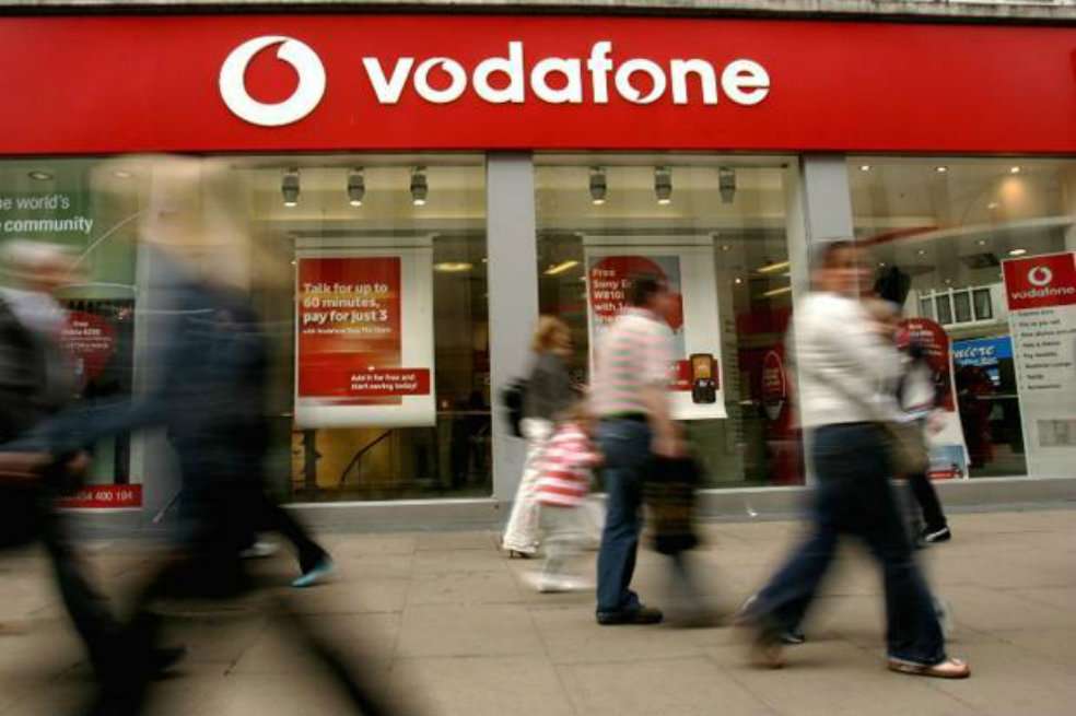Debido a los rumores de una posible transacción, la acción de Vodafone cerró con un alza de 2,89% en la Bolsa de Londres. / AFP