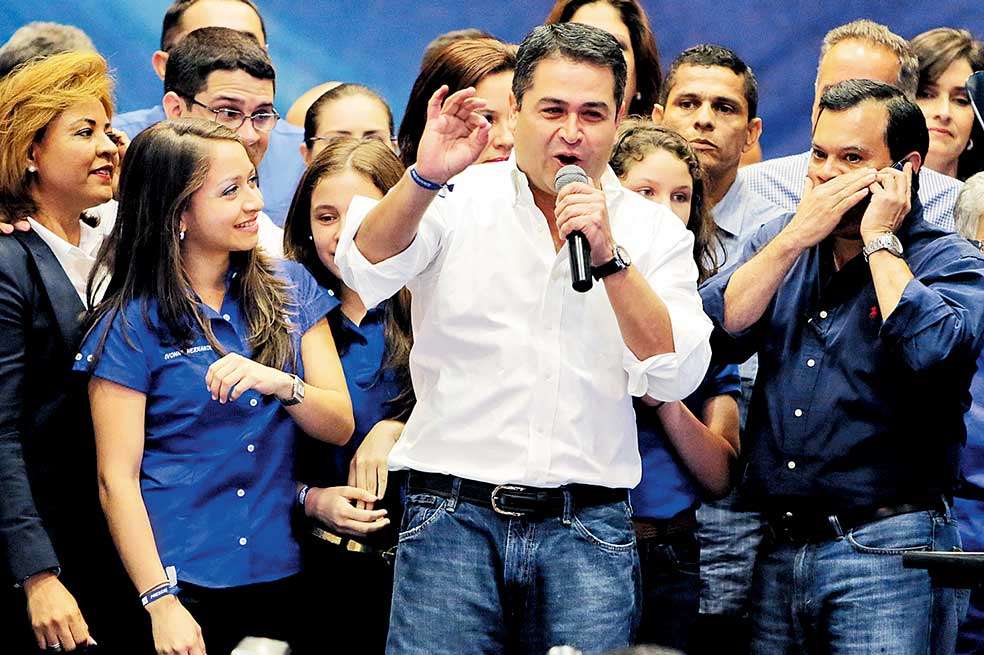 Juan Orlando Hernández es militante del Partido Nacional de Honduras. / AFP