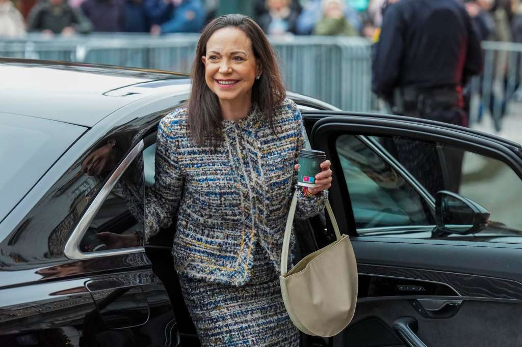 Oslo (Norway), 12/12/2025.- Nobel Peace Prize laureate Maria Corina Machado arrives at the Grand Hotel after her audience at the Palace in Oslo, Norway, 12 December 2025. She received the Nobel Peace Prize 2025 for her tireless work promoting democratic rights for the people of Venezuela and for her struggle to achieve a just and peaceful transition from dictatorship to democracy. (Noruega) EFE/EPA/OLE BERG-RUSTEN NORWAY OUT