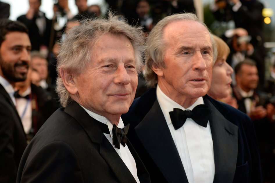 El director Roman Polanski y el piloto de Fórmula 1 Jackie Stewart en el Festival de Cannes 2013.