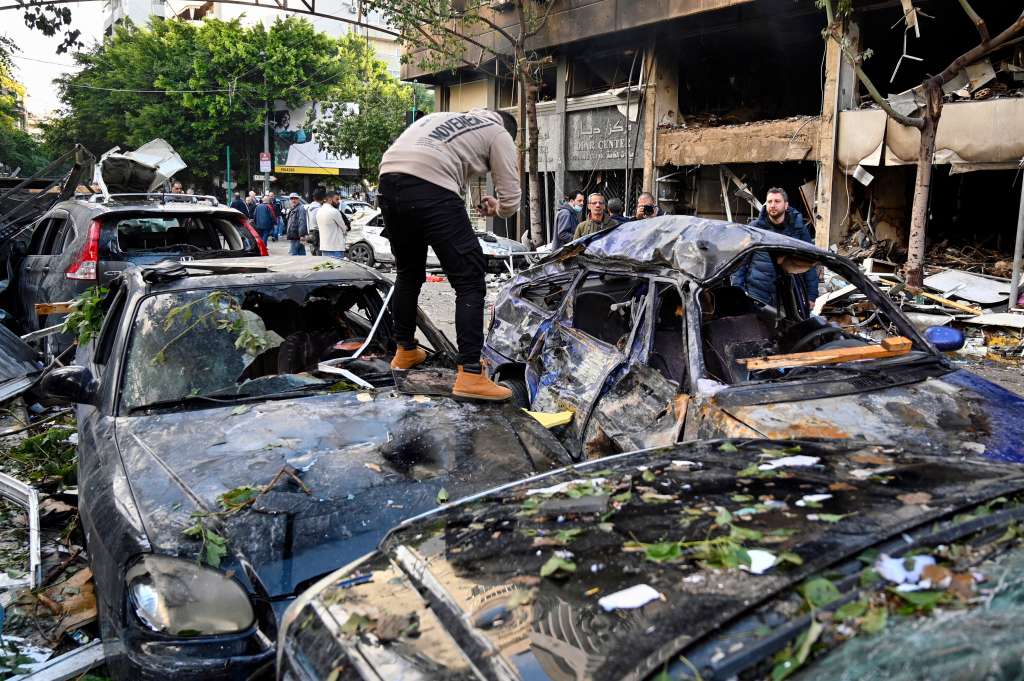 Beirut (Lebanon), 18/11/2024.- A man inspects his damaged car following an Israeli airstrike in Mar Elias Street, Beirut, Lebanon, 18 November 2024. According to the Lebanese Ministry of Health, two people were killed and twenty-two others were injured in the incident. According to the Lebanese Ministry of Health, more than 3,400 people have been killed and over 14,700 others have been injured in Lebanon since the escalation in hostilities between Israel and Hezbollah. (Líbano, Hizbulá/Hezbolá) EFE/EPA/WAEL HAMZEH