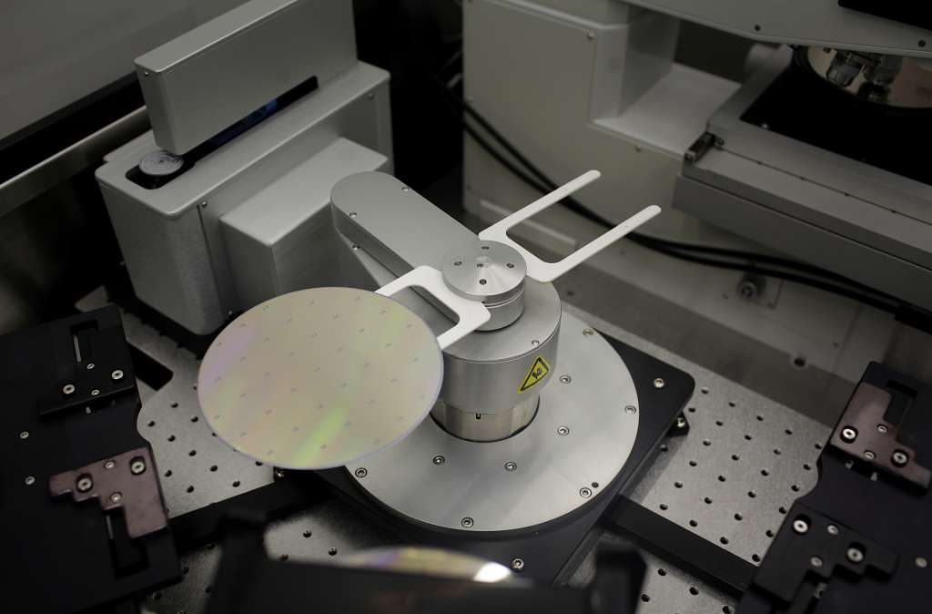 A Gallium Arsenide semiconducting wafer is processed into chips for radio frequency communications devices at RF Micro Devices Inc. (RFMD) headquarters in Greensboro, North Carolina, U.S., on Wednesday, Feb. 15, 2012. RF Micro Devices Inc. manufactures radio-frequency components and semiconductor technologies. Photographer: Victor J. Blue/Bloomberg