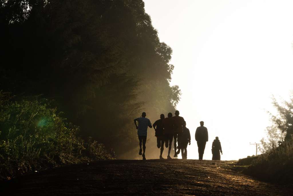(FILES) A group of runners takes part a training session on March 11, 2019 in Kaptagat, Kenya.