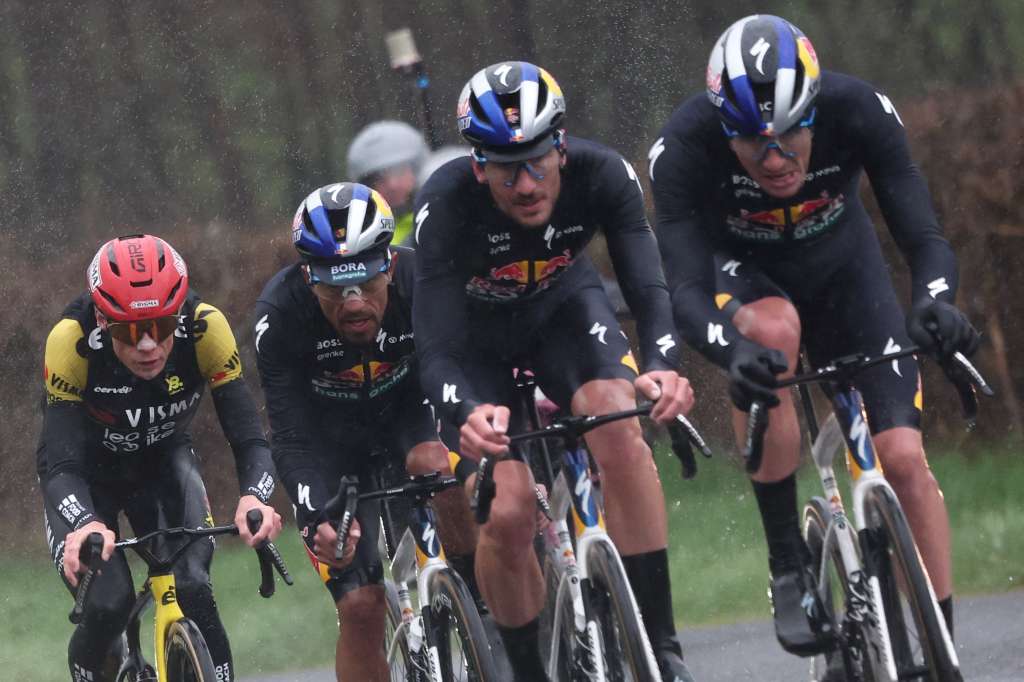 Team Visma - Lease a Bike's Danish rider Jonas Vingegaard (L) and Red Bull - BORA - hansgrohe's Colombian rider Daniel Felipe Mart�nez (2nd L) cycle in a breakaway during the 4th stage of the Paris-Nice cycling race, 195 km between Bourges and Uchon, on March 11, 2026. (Photo by Anne-Christine POUJOULAT / AFP)