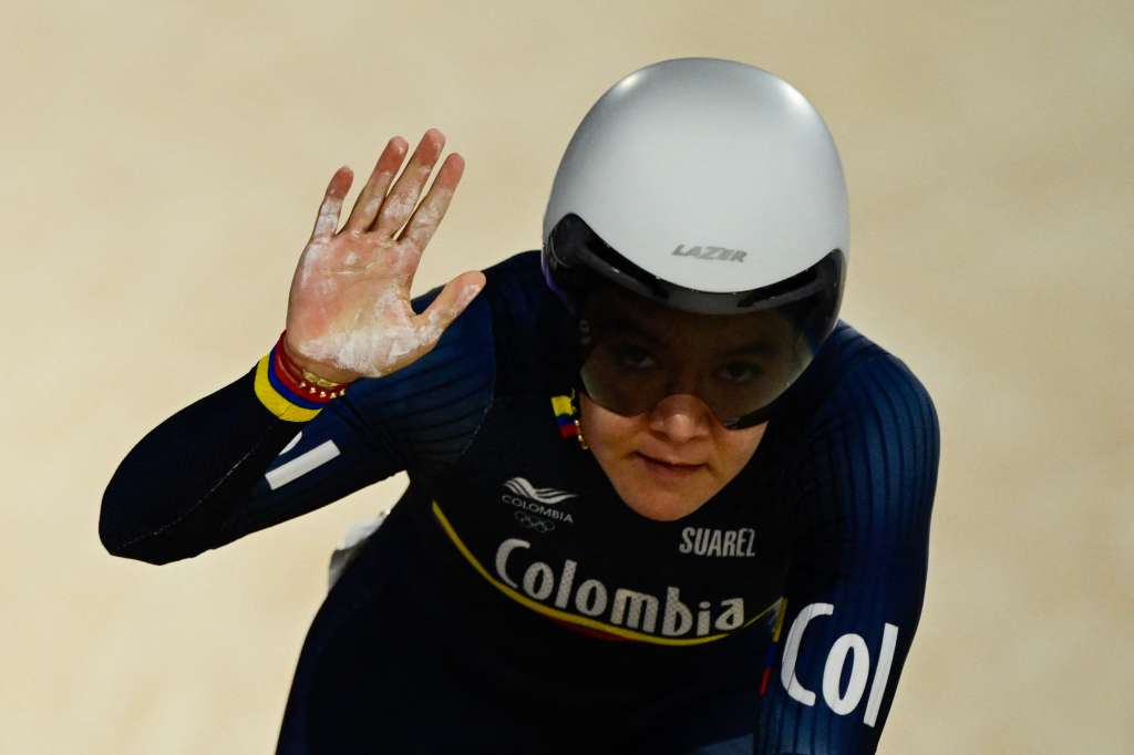 Colombia's Martha Bayona Pineda reacts in the women's track cycling sprint 1/32 final of the Paris 2024 Olympic Games at the Saint-Quentin-en-Yvelines National Velodrome in Montigny-le-Bretonneux, south-west of Paris, on August 9, 2024. (Photo by John MACDOUGALL / AFP)