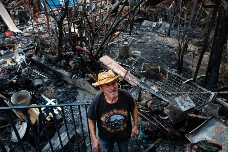 Jose Fernandez is pictured at his burnt-out home following a devastating wildfire in Pelayos de la Presa, 65 kilometers west of Madrid, on July 28, 2026.
