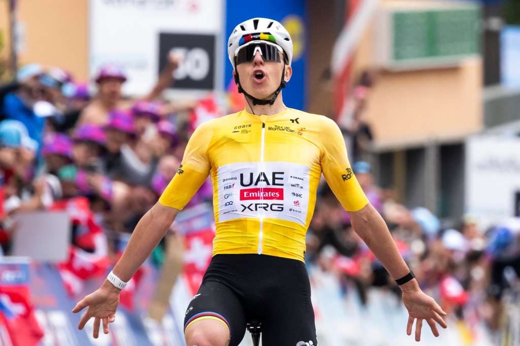 LEYSIN (Switzerland), 03/05/2026.- Tadej Pogacar from Slovenia of UAE Team Emirates XRG raises his arms after crossing the finish line to win during the fifth and last stage, a 178,2 km race between Lucens and Leysin at the 79th Tour de Romandie UCI World Tour Cycling race, in Leysin, Switzerland, 03 May 2026. (Ciclismo, Eslovenia, Suiza) EFE/EPA/JEAN-CHRISTOPHE BOTT