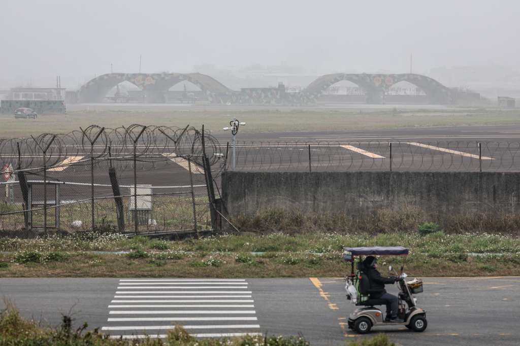 Two Taiwanese Air Force Mirage 2000 fighter jets (top) are seen at an air force base in Hsinchu on February 27, 2025.