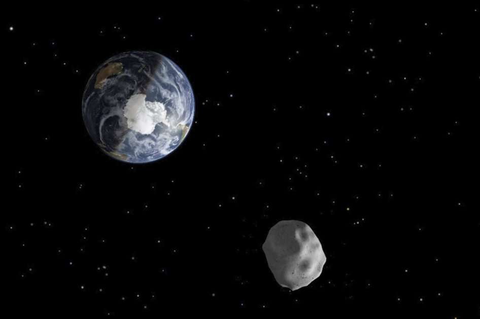 Recreación hecha por la NASA que muestra el asteroide que pasó muy cerca de la tierra el 15 de febrero./ EFE