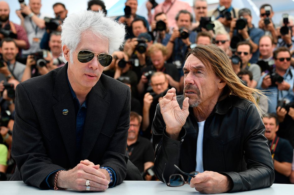 El director Jim Jarmusch y el músico Iggy Pop en Cannes. / AFP