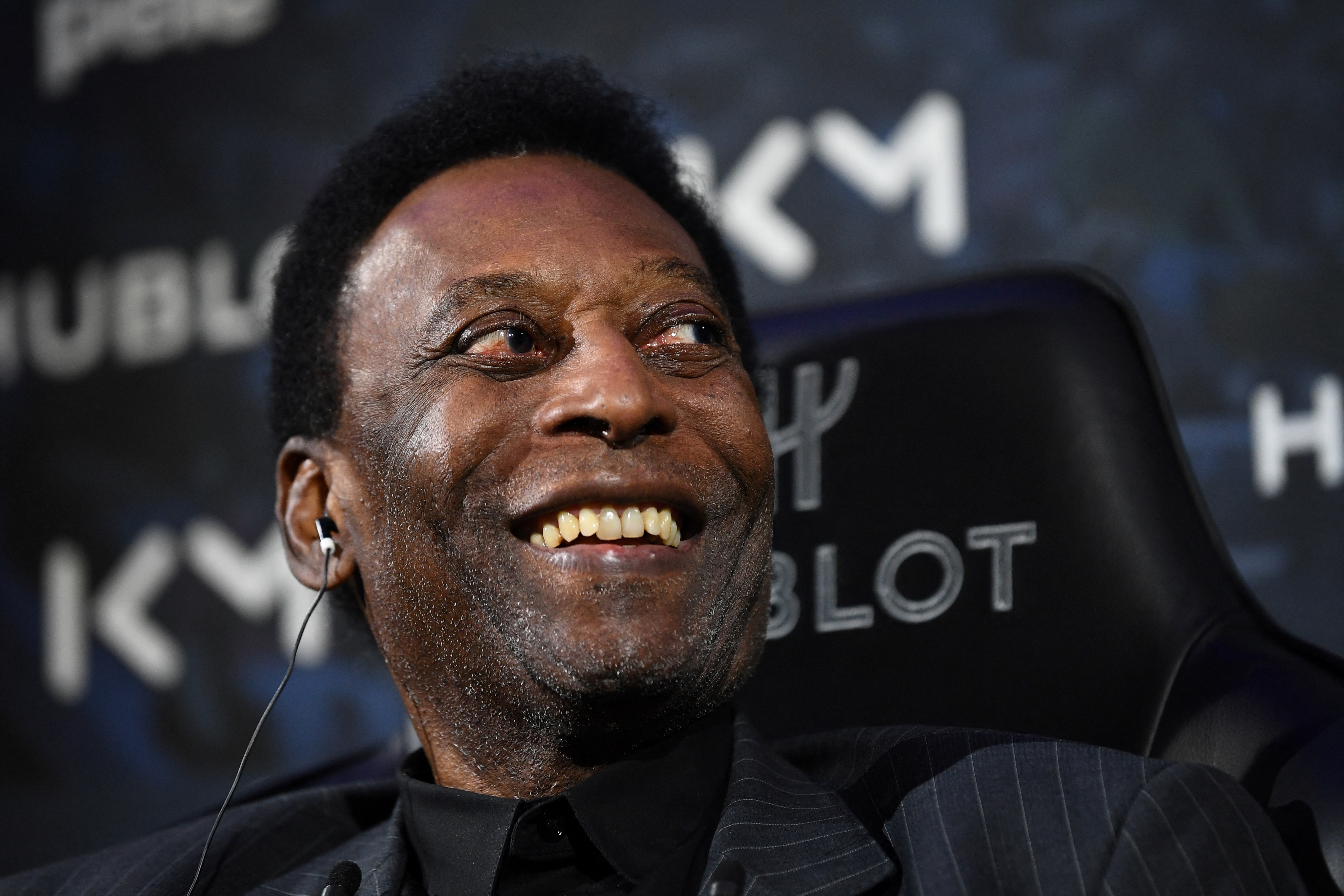(FILES) Brazilian football legend Pele speaks during a meeting with Paris Saint-Germain (PSG) and France national football team forward Kylian Mbappe at the Hotel Lutetia in Paris on April 2, 2019.