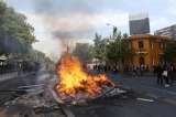 Suspenden alza del Metro y decretan toque de queda ante protestas en Chile