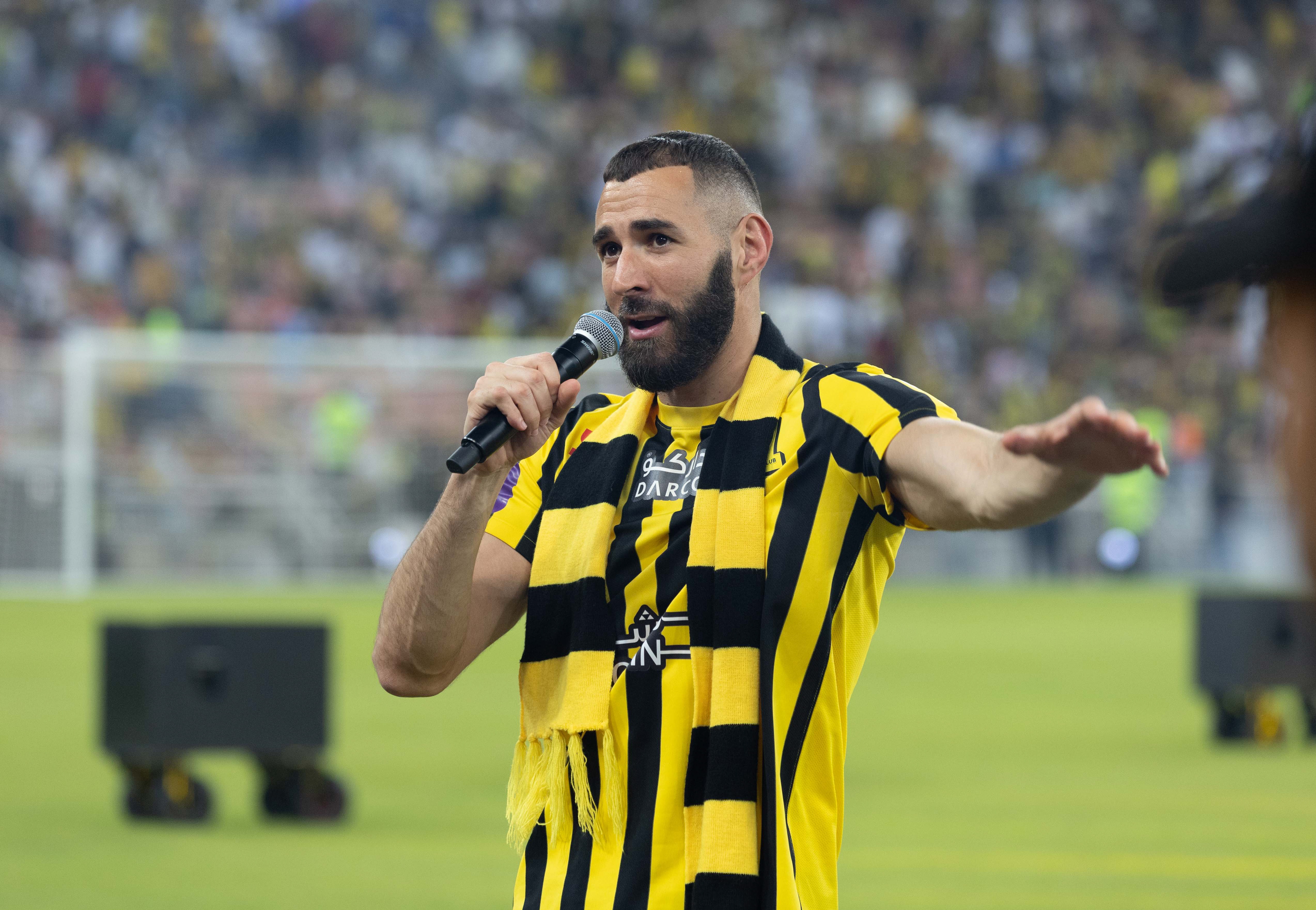 Jeddah (Saudi Arabia), 08/06/2023.- French soccer player Karim Benzema speaks to fans during a presenting event after joining Al Ittihad, in Jeddah, Saudi Arabia, 08 June 2023. Benzema was officially presented in front of the fans at Al-Jawhara stadium of King Abdullah Sports City in Jeddah after signing a three-year contract for the Saudi Champions Al-Ittihad. (Arabia Saudita) EFE/EPA/STR