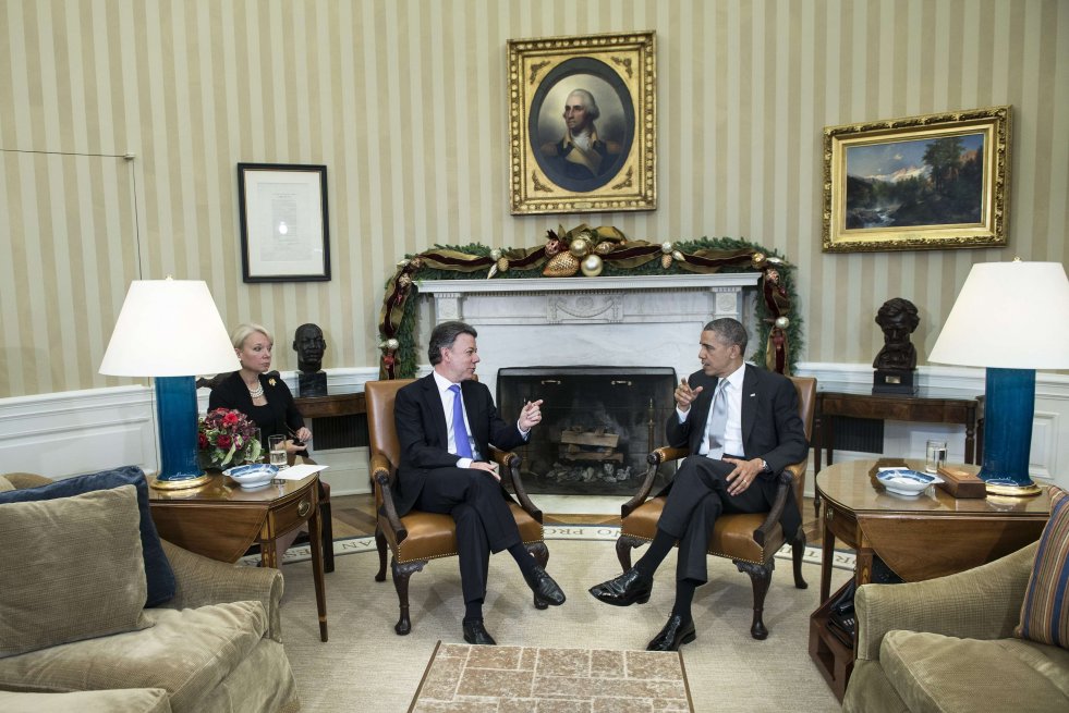 El presidente Juan Manuel Santos junto a su colega de Estados Unidos, Barack Obama. / AFP