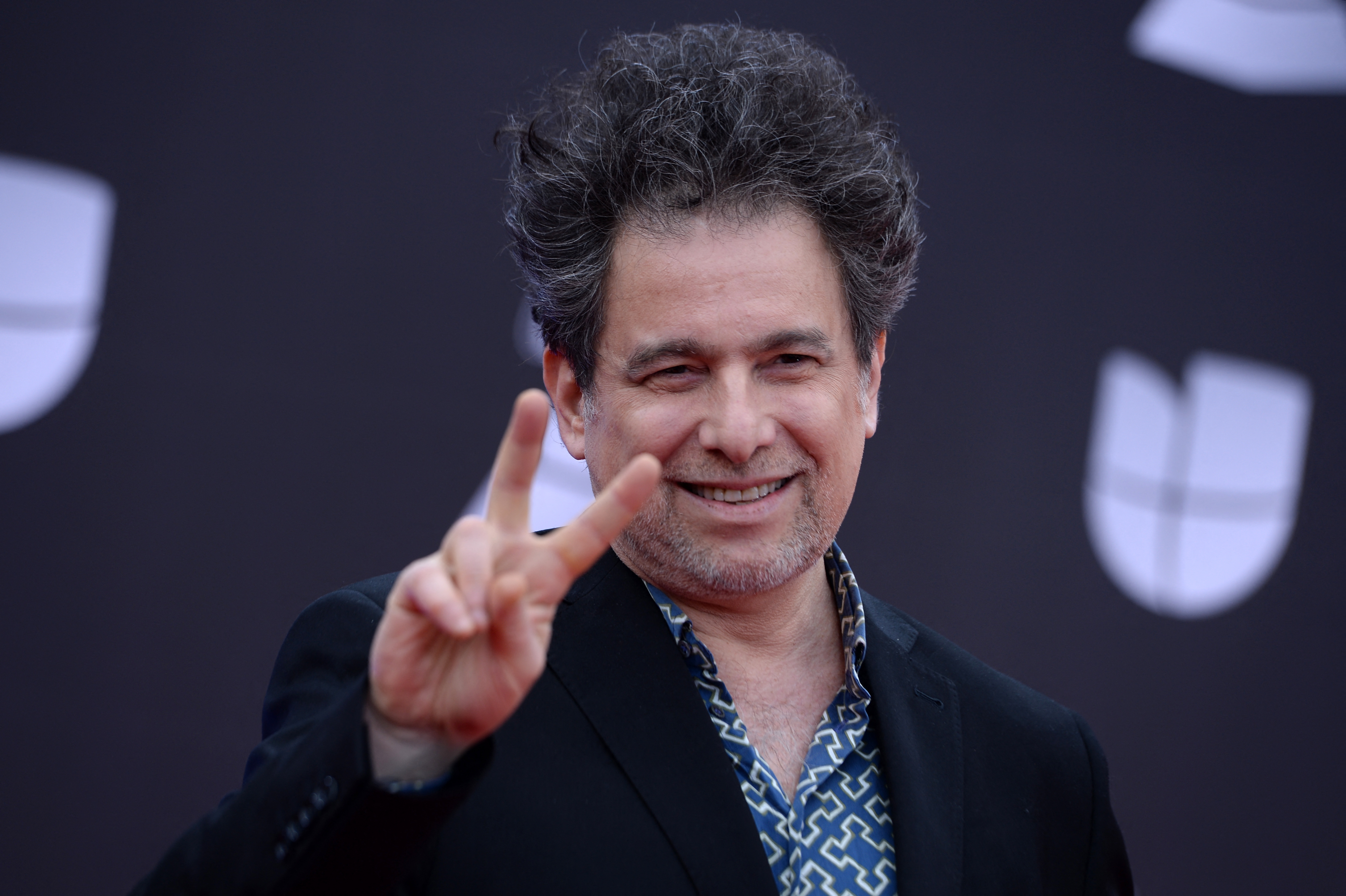 (FILES) Argentine musician Andres Calamaro arrives at the 20th Annual Latin Grammy Awards in Las Vegas, Nevada, on November 14, 2019.