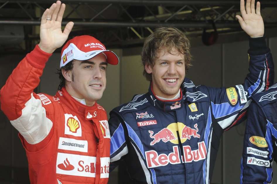 Fernando Alonso (izquierda) junto a Sebastian Vettel (derecha).