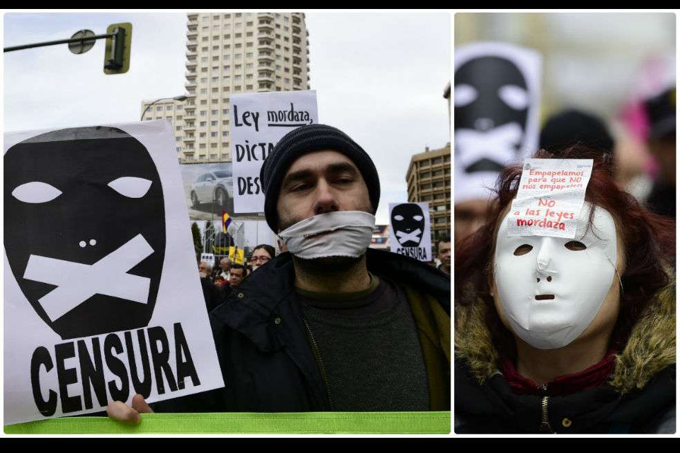 La foto es de una manifestación en España contra la denominada 'Ley Mordaza' que aumentaba las penas contra los delitos de orden público. No obstante, refleja la preocupación en Colombia sobre la denominada 'ley del periodista' que, según críticos, ponía en riesgo la libertad de expresión. / Archivo AFP