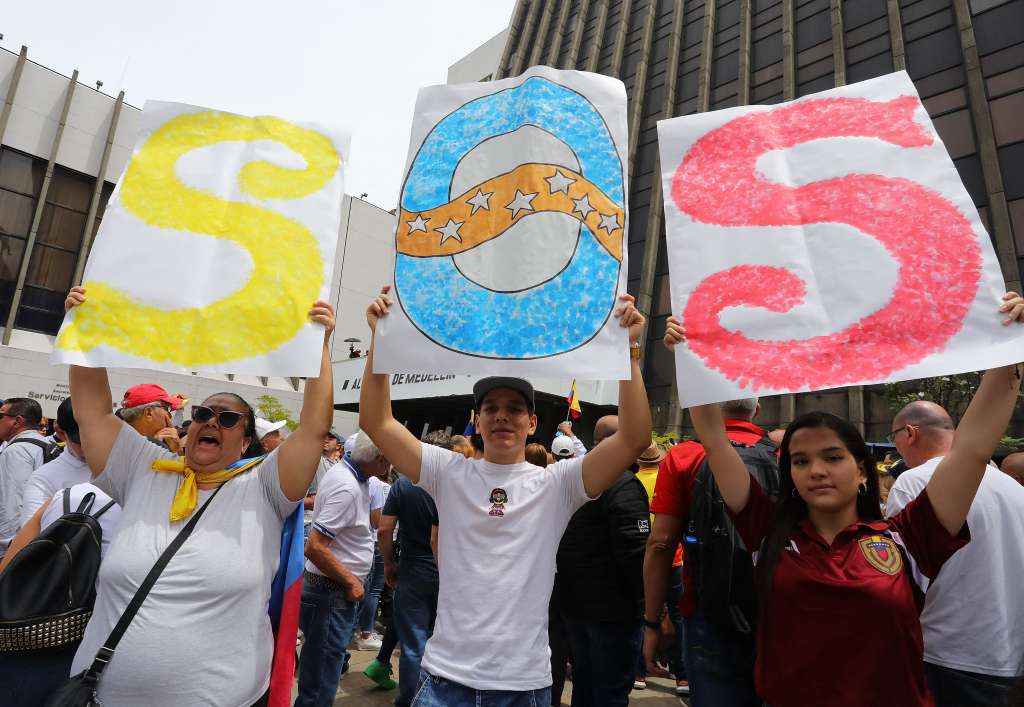 Venezuelans living in Colombia take part in a protest against Venezuelan President Nicolas Maduro's disputed victory in the presidential election, in Medellin, Colombia, on August 7, 2024.