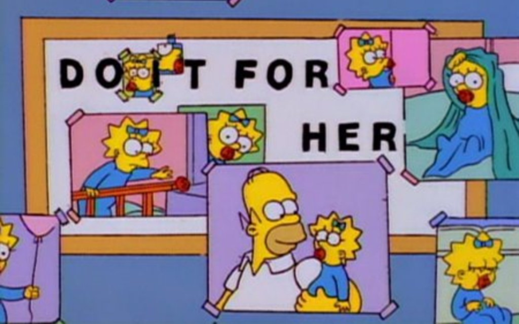 Homero Simpson tiene todas las fotos con Maggie en su puesto de trabajo para recordar su amor por ella.