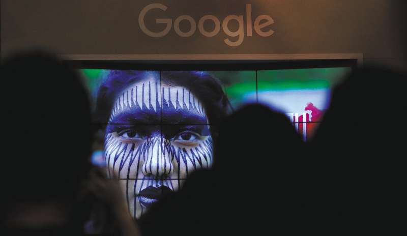 Brazilian indigenous people and representatives from google talk about the project "I'm Amazon by Google" during the presentation of new Google Earth project in Sao Paulo, Brazil July 11, 2017. REUTERS/Leonardo Benassatto - RC11099E90B0