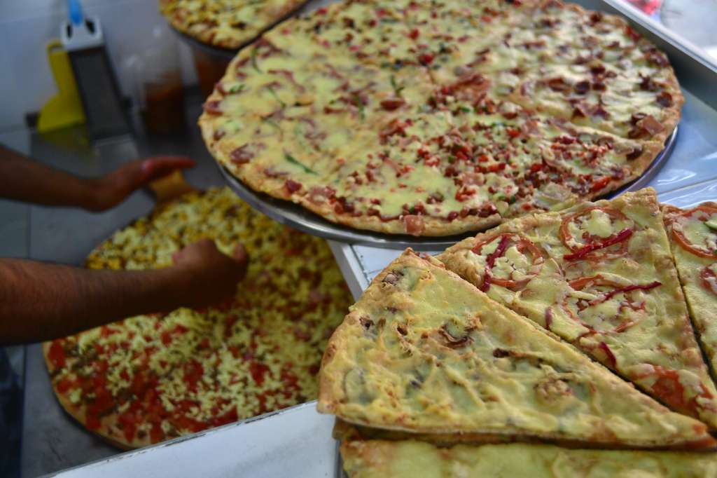 Recorrido por pizzerías de barrio.