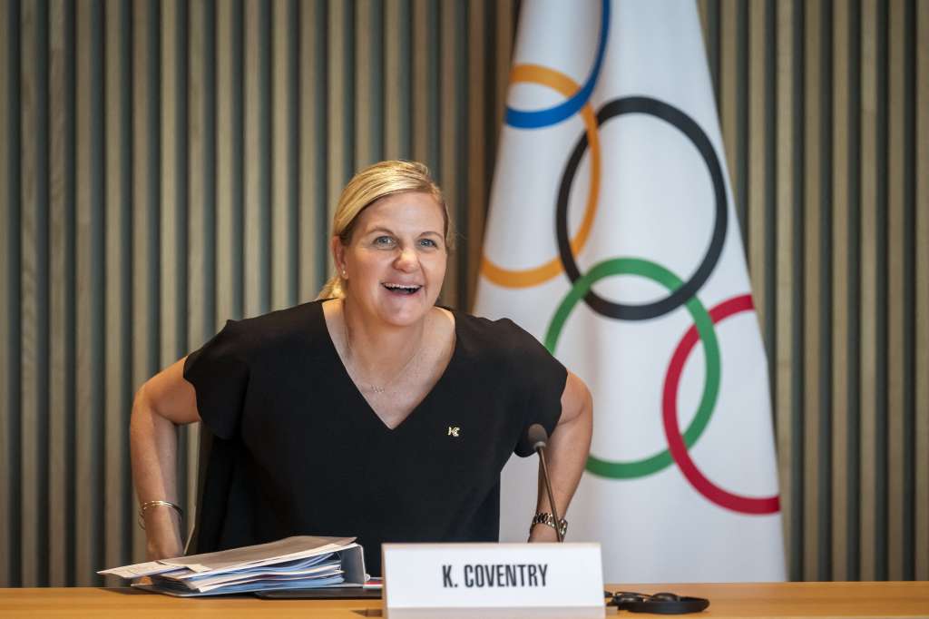 President of the International Olympic Committee Kirsty Coventry smiles seating or her first meeting of the International Olympic Committee (IOC) executive commission as IOC president, at Olympic House in Lausanne, on June 25, 2025.