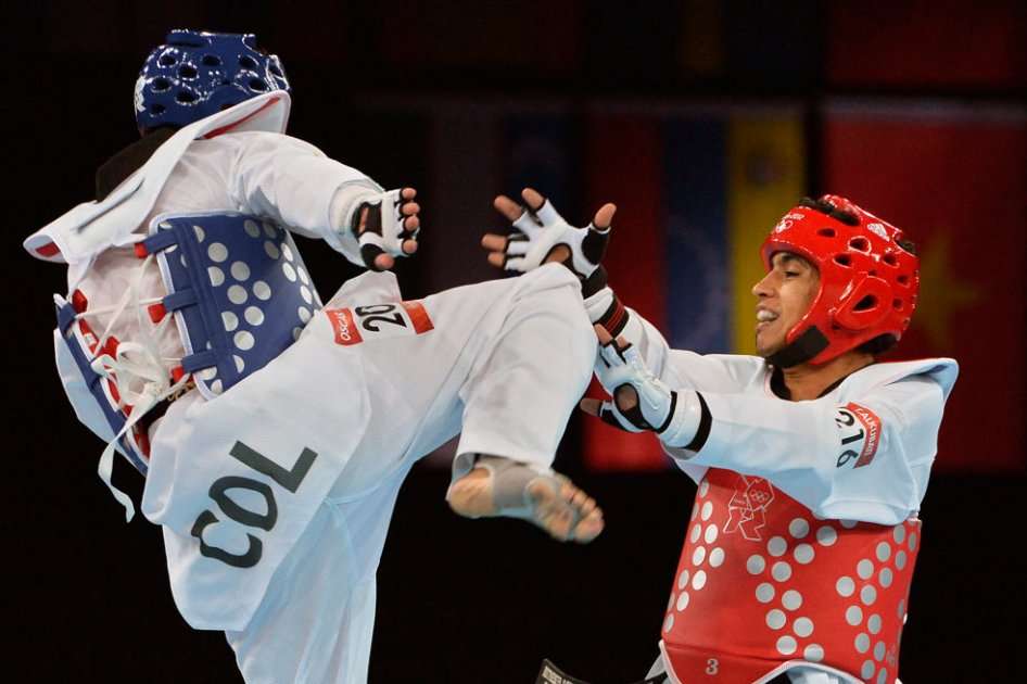 Oscar Muñoz Oviedo en combate. Foto: EFE