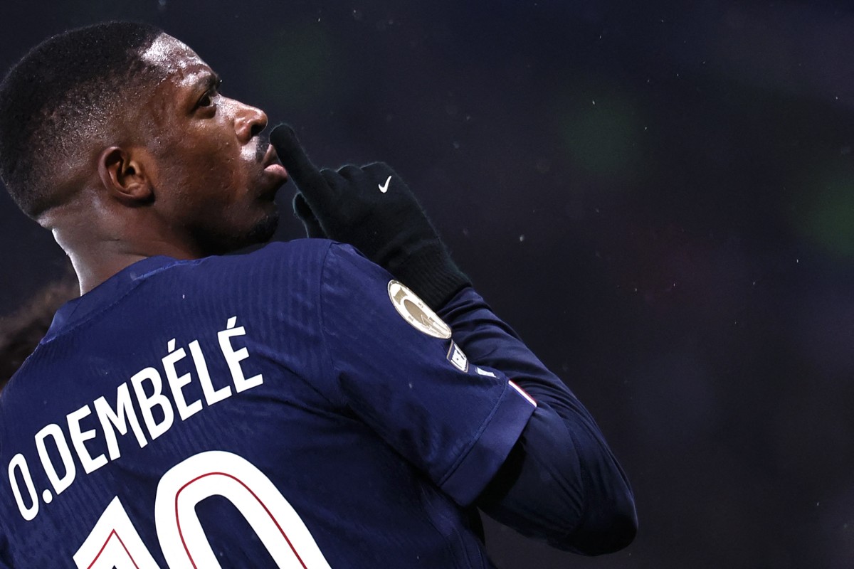 TOPSHOT - Paris Saint-Germain's French forward #10 Ousmane Dembele gestures as he celebrates after scoring Paris Saint-Germain's first goal during the French L1 football match between Paris Saint-Germain (PSG) and Lille LOSC at the Parc des Princes stadium in Paris on January 16, 2026. (Photo by Anne-Christine POUJOULAT / AFP)